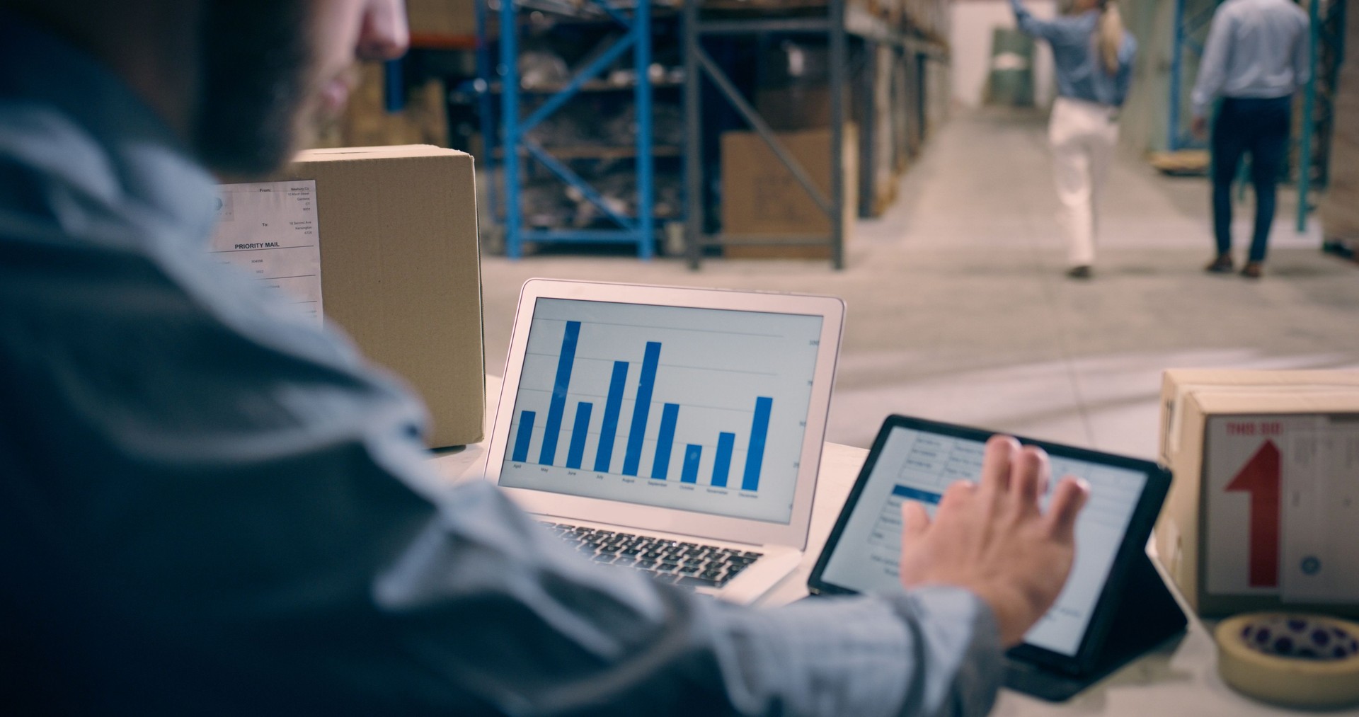 Man, warehouse and tablet screen for data analytics, e commerce graphs or sales in logistics. Analyst, supplier or seller on digital technology of stock distribution, shipping boxes or package charts